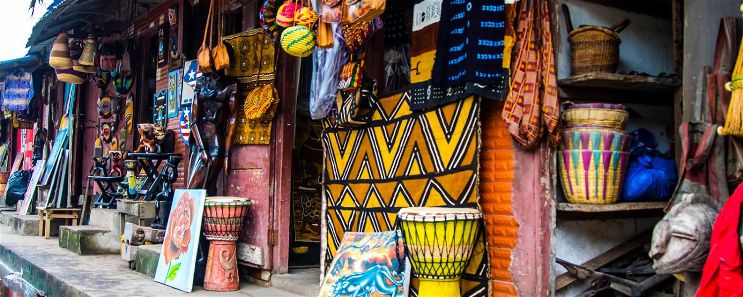 Liberian market with traditional crafts and cultural items